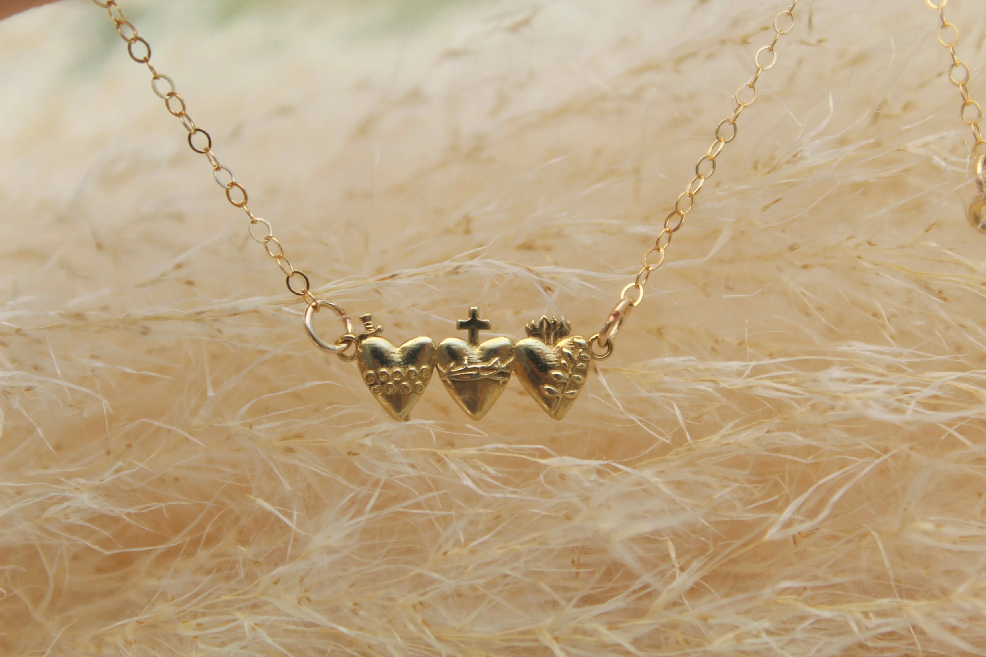 Holy Family Hearts® In Polished Brass Tiny Version